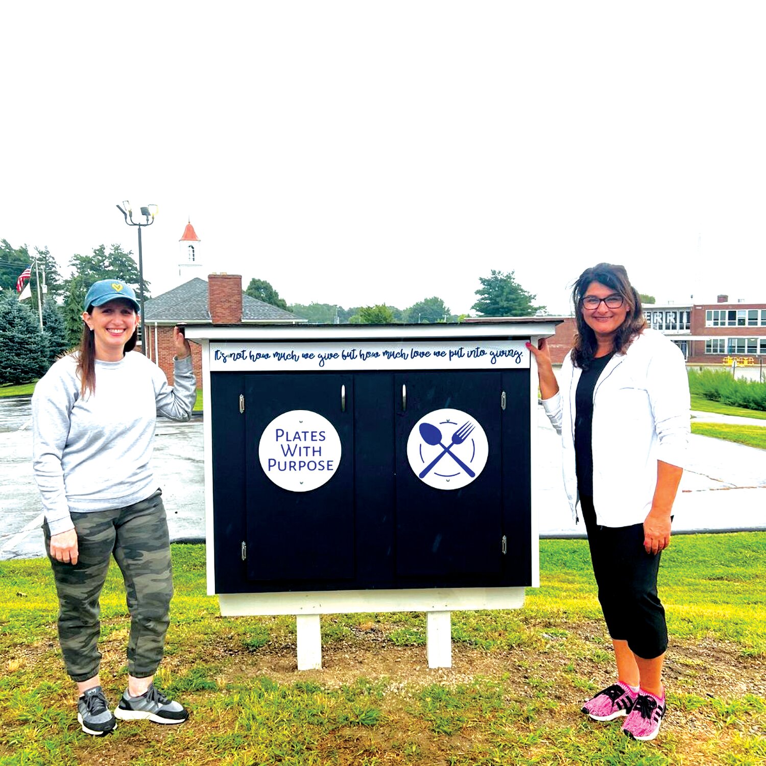 A BIT OF HOPE: Jenn Capracotta and Jen Fantozzi have fully stocked the Hope Chest they placed along Memorial Avenue next to Marian J. Mohr Memorial Library. The co-founders of Plates With Purpose have also opened a second Hope Chest in North Providence. (Photos courtesy Jenn Capracotta)
